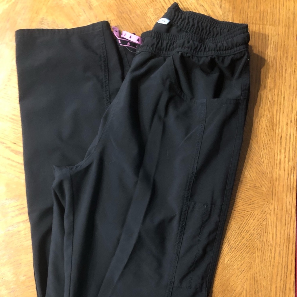 Black scrub pants with cute heart details!